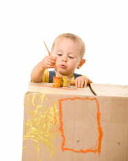 stock-photo-7081499-small-child-painting-a-box
