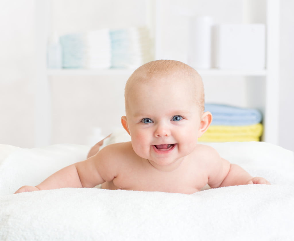 smiling-baby-is-on-the-stomach-mimobox